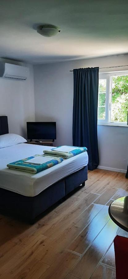 Guesthouse Sime Kolan Bagian luar foto